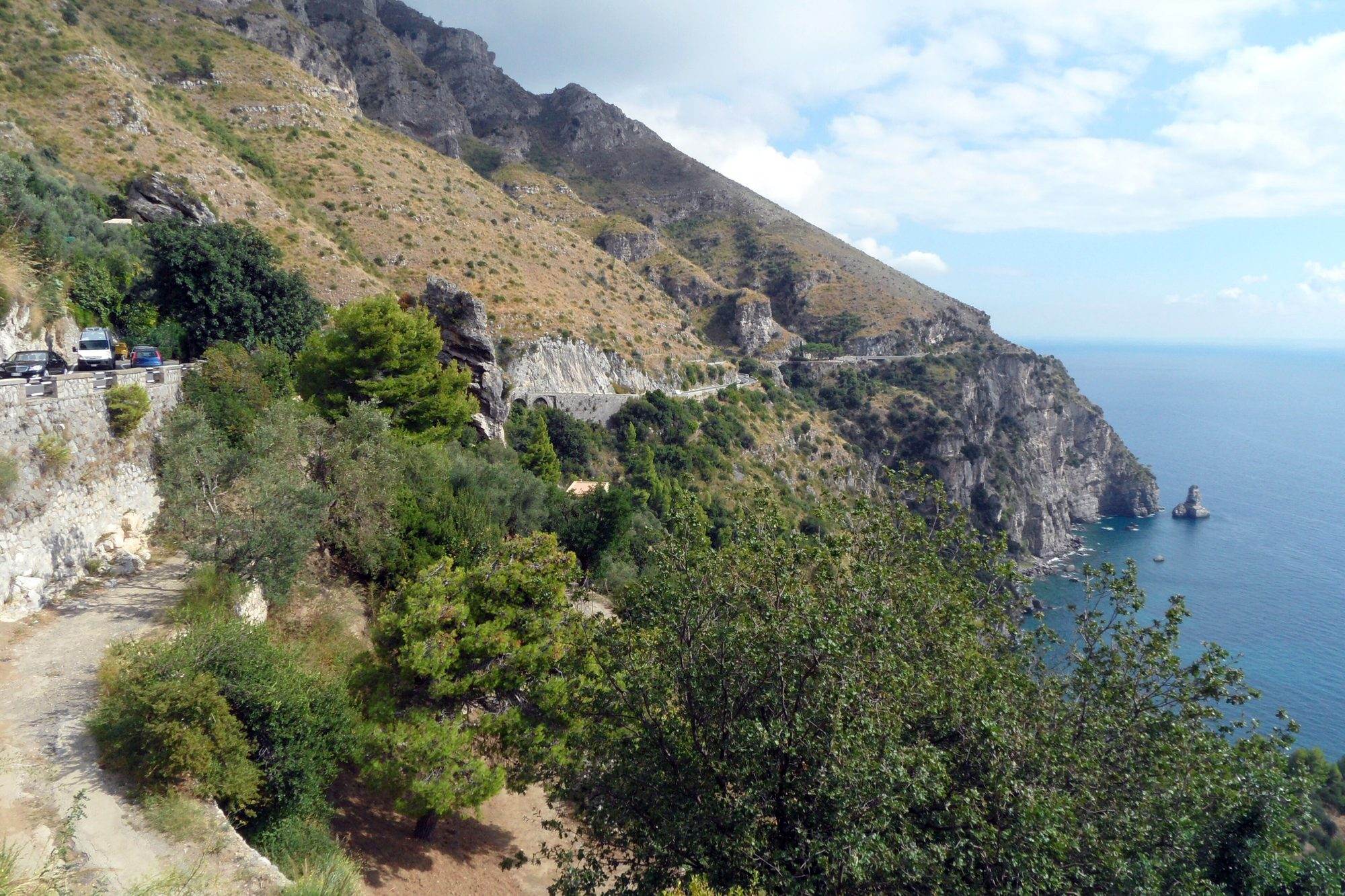 Wide panorama of the Amalfi Coast with its villages above the sea