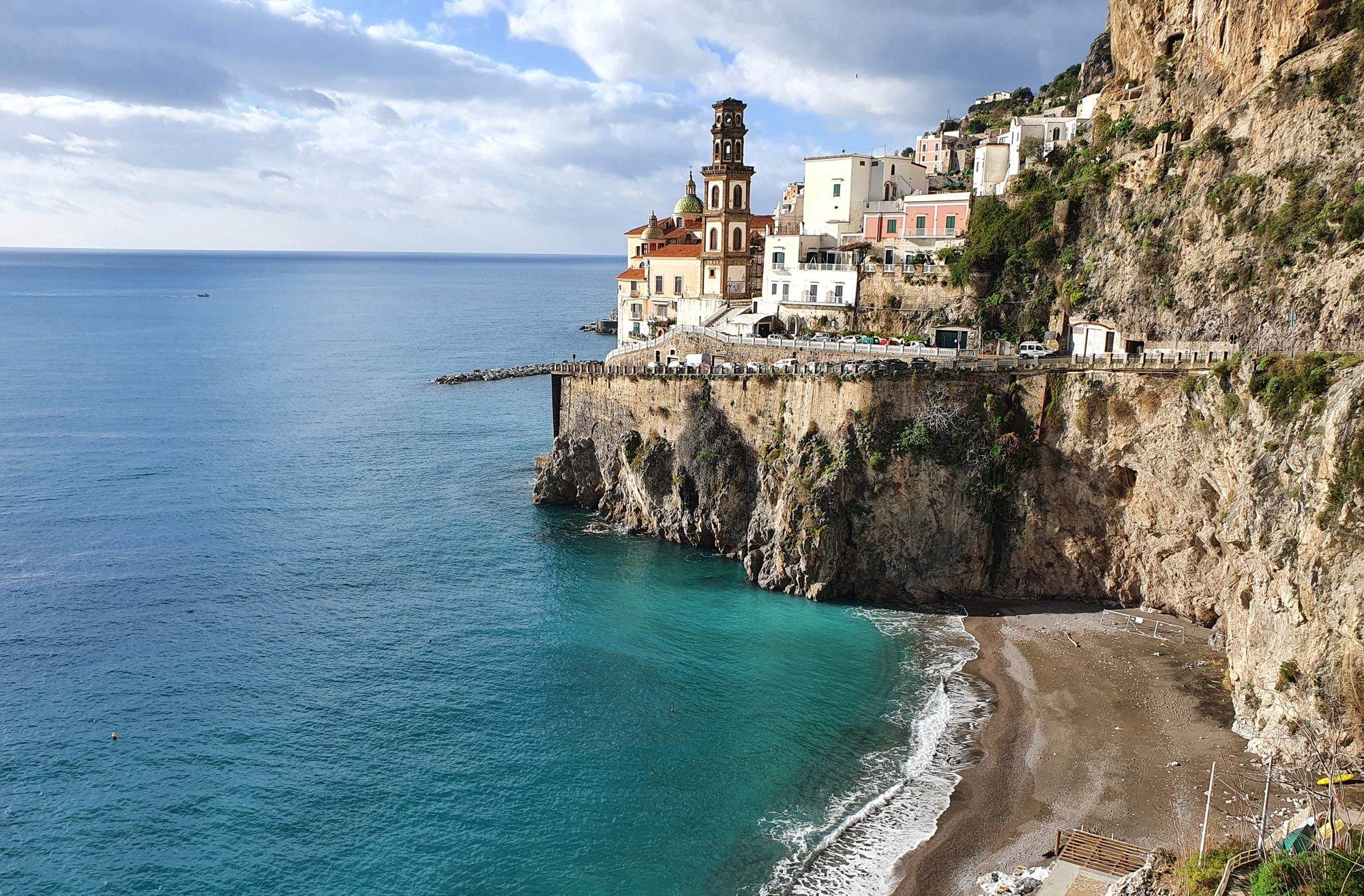 The village of Atrani seen from the sea, wedged between two headlands on the Amalfi Coast