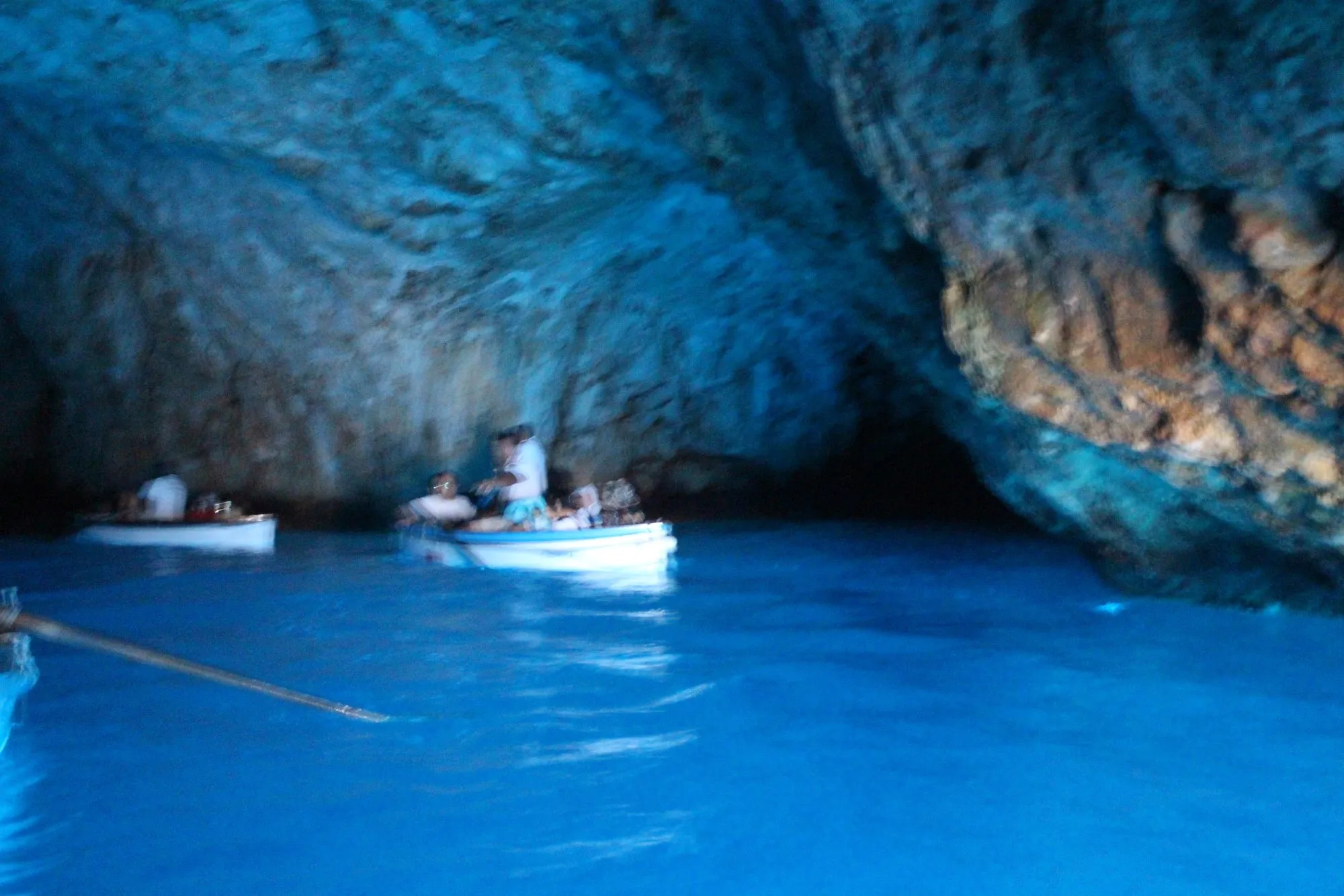 Rowing boats at the entrance to the Blue Grotto on Capri
