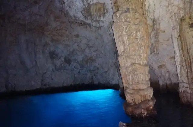Inside the Grotta dello Smeraldo at Conca dei Marini with the water lit green