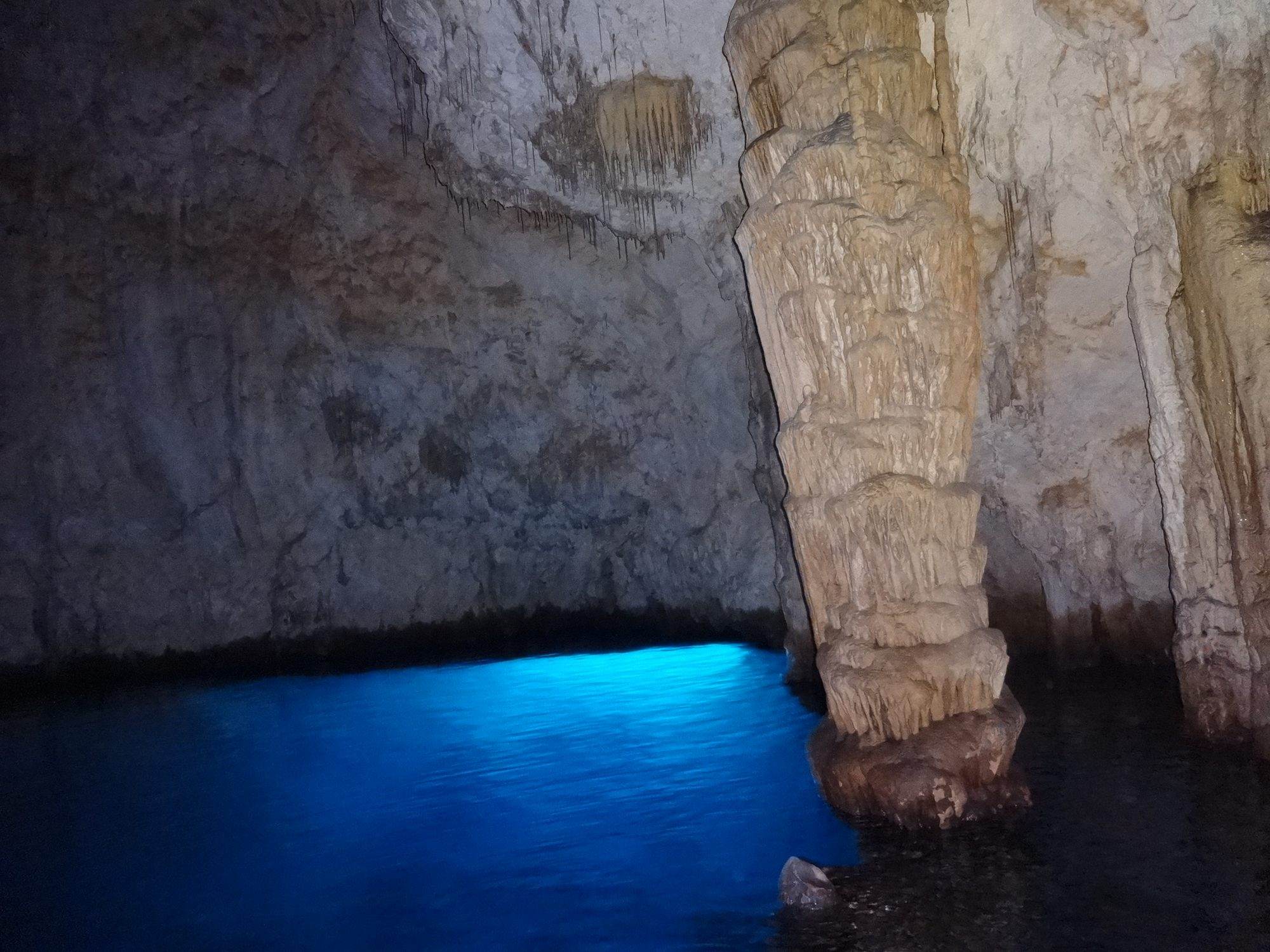 Inside the Grotta dello Smeraldo at Conca dei Marini with the water lit green