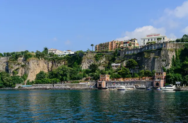 The cliffs of Sorrento seen from the sea, with buildings along the clifftop